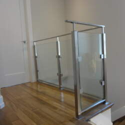 glass-railing-in-home-with-rail