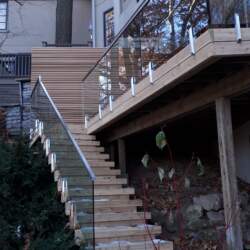 wooden-staircase-glass-railing-with-top-frame